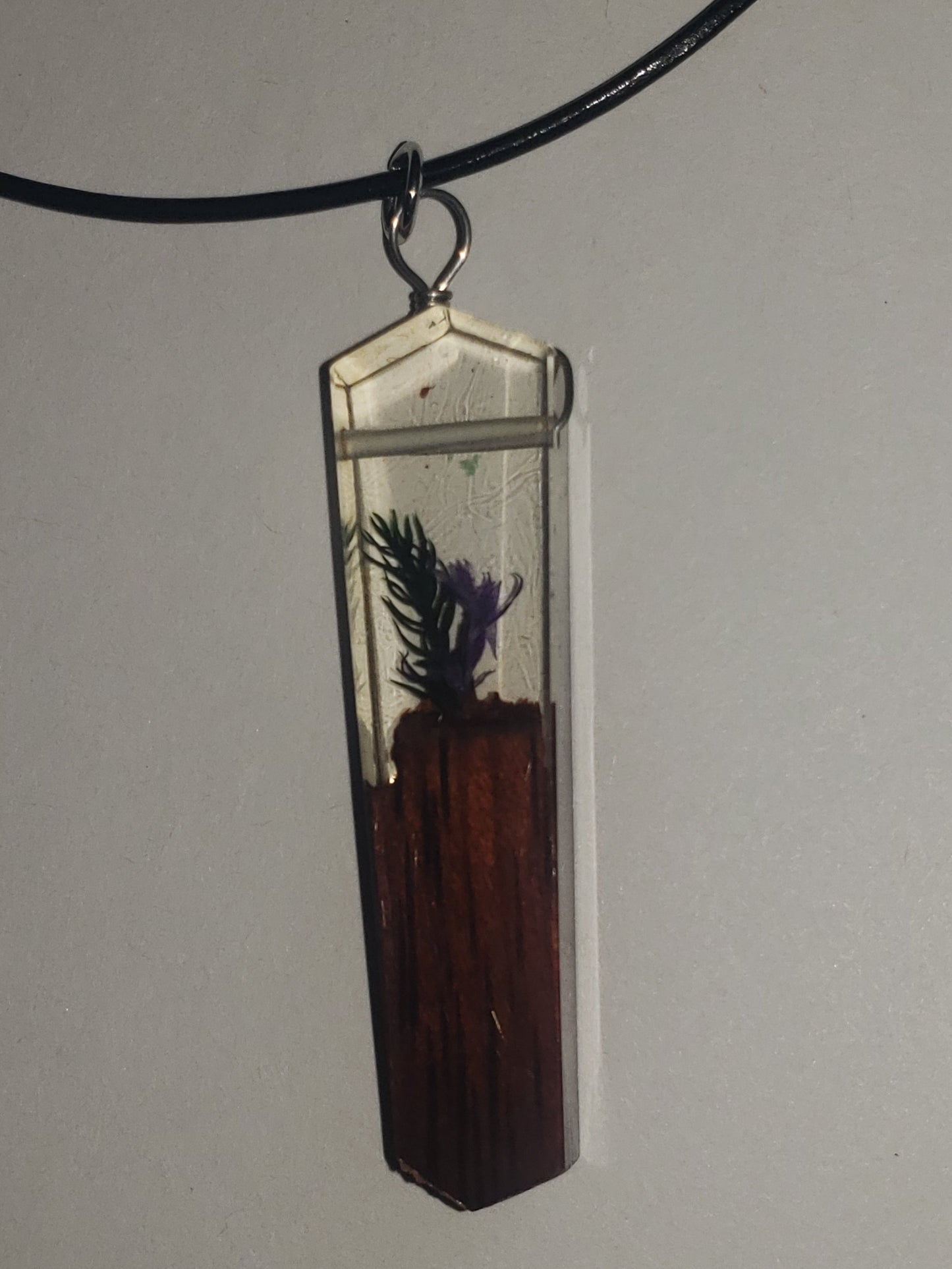 Resin pendant with dried flowers and wood