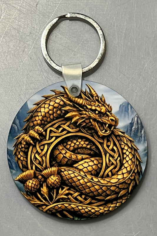Golden dragon with celtic knot circle in the foreground with misty mountains are in the background. 