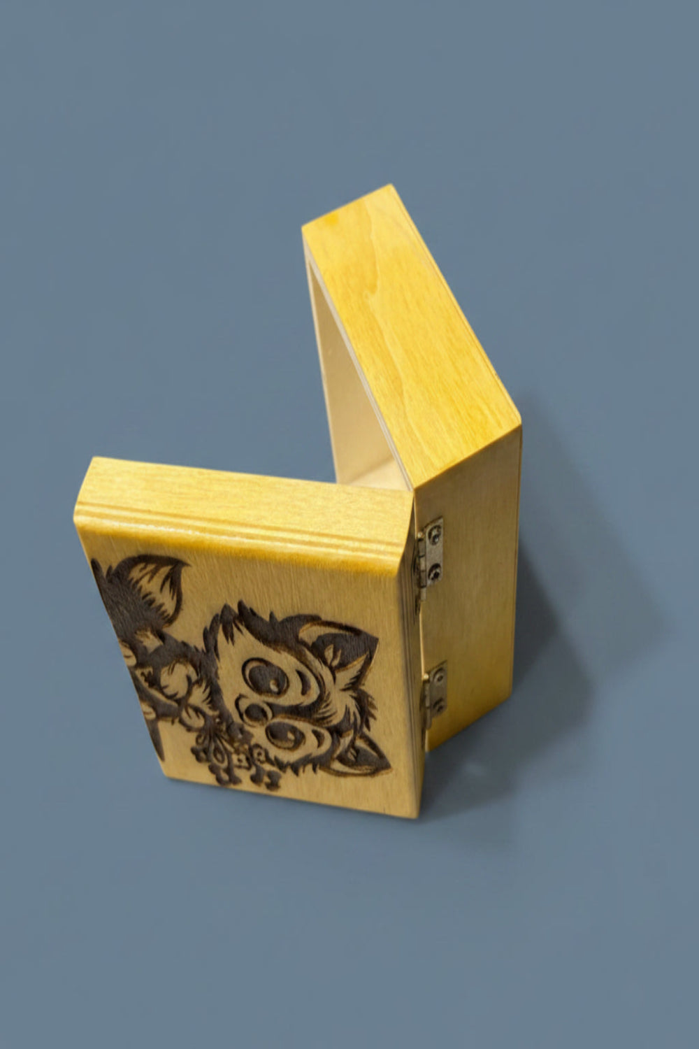 Hinged wooden box with decorative lid 