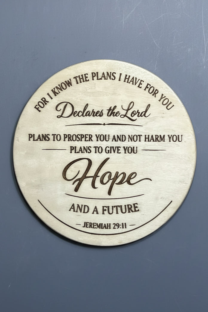 Round wooden plaque with engraved bible verse
