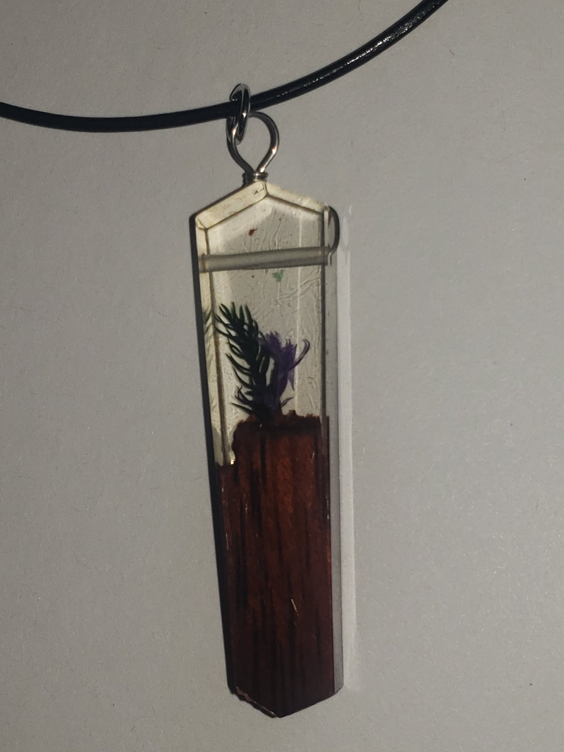 Resin pendant with dried flowers and wood