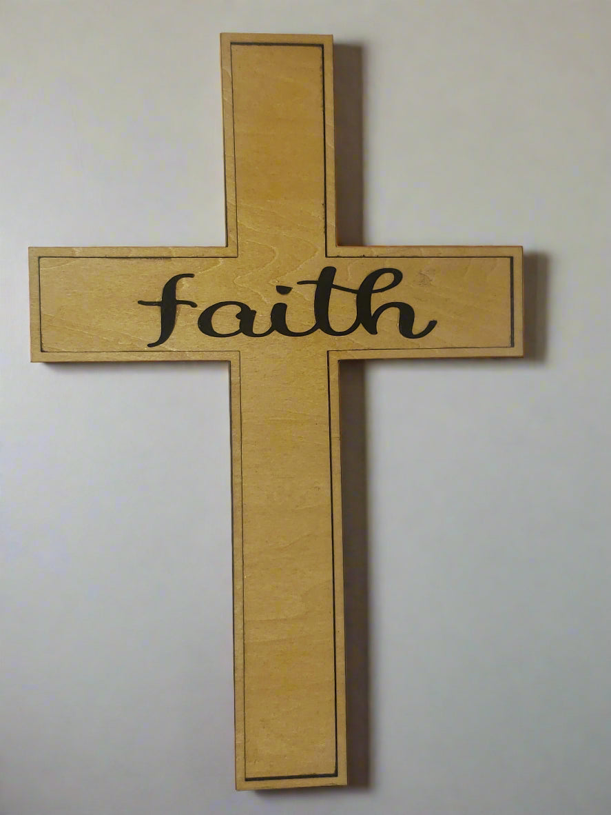 Wooden Cross Wall Decor with 'faith' layered in 3D across the center.  